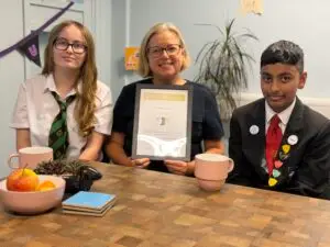 Mental health and wellbeing lead, Karen Lamb with the chair mental health ambassadors, Leah and Taha