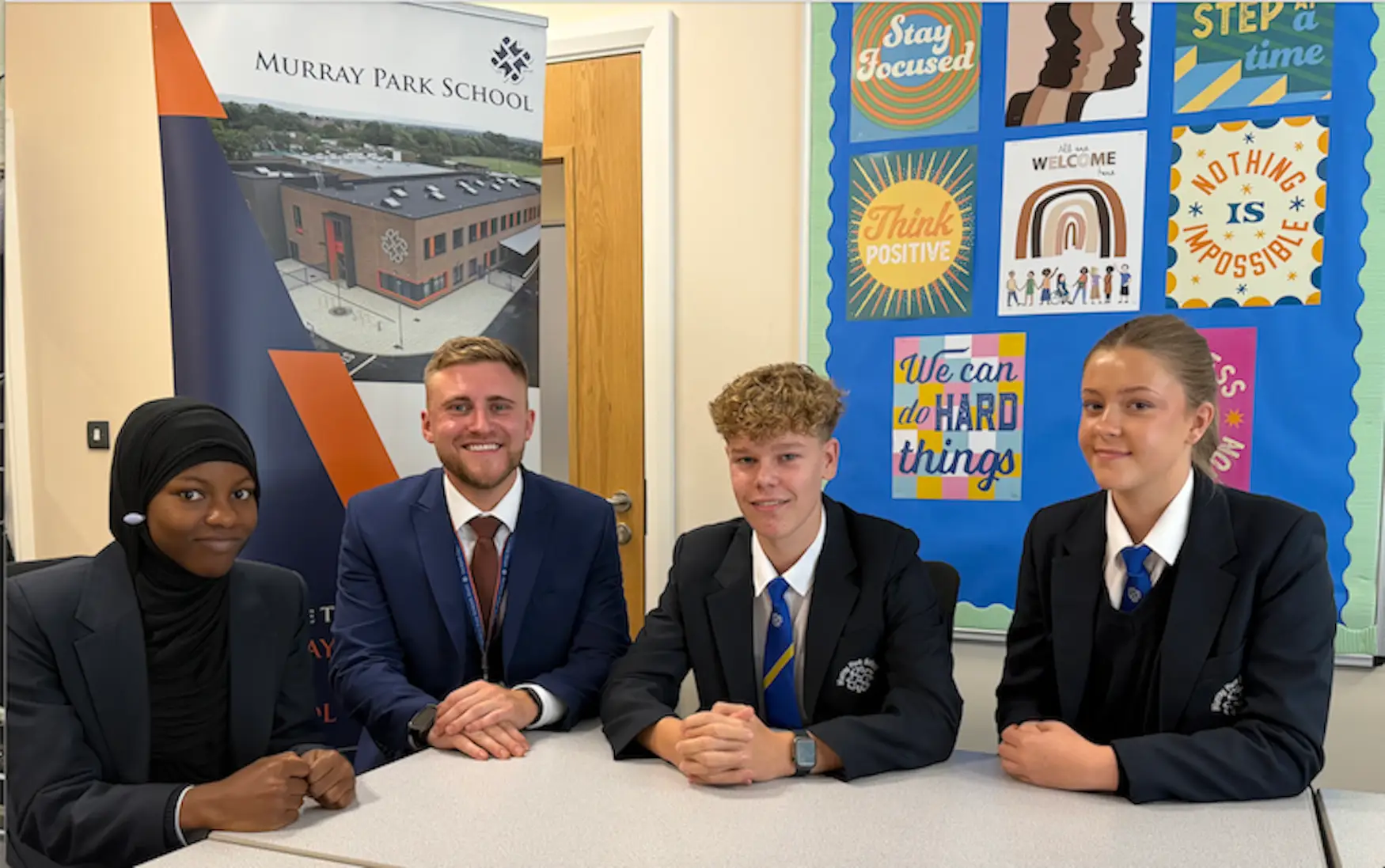 From left to right - Pupil Aleeyah Adeboye, acting head teacher George Hagen, head boy Billy Rose and head girl Darcie Wileman.